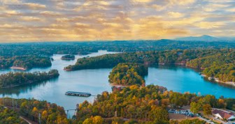 Sun setting over a river delta.