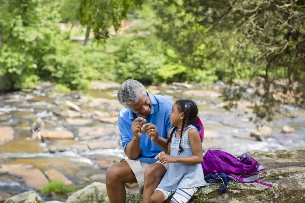 Grandfather and granddaughter enjoying Indian Springs National Park
