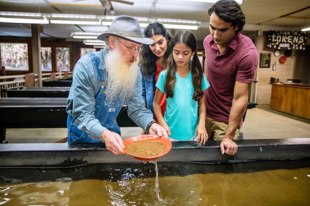 Family panning for gold in Dahlonega Georgia